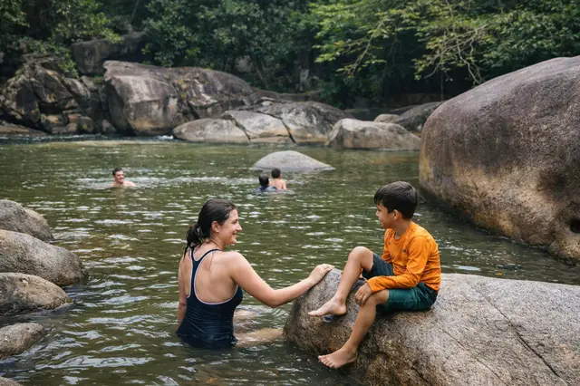 Mother and son at the natural swimming pools at Charco El Hippie Naguabo Puerto Rico