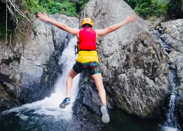 Guests hiking through El Yunque rainforest trail